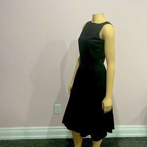 Brand new never worn Queen of Holloway little black pleated dress size M